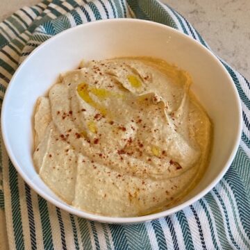 Simple classic hummus sprinkled with paprika