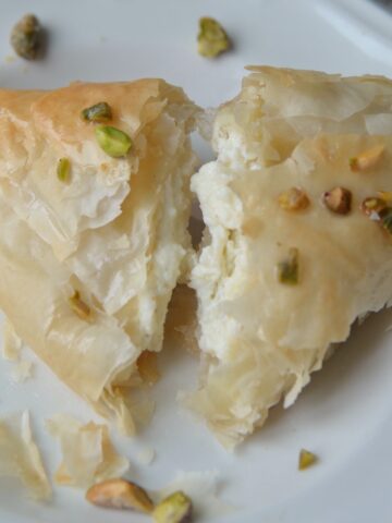 Shaabiyat lebanese pastry garnished with chopped pistachios.