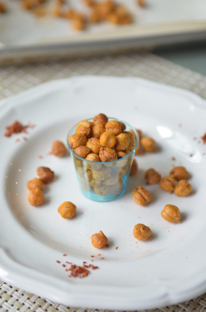 Sweet and Spicy roasted chickpeas in a cup.