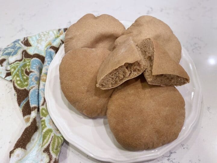 Loaves of homemade whole wheat pita bread