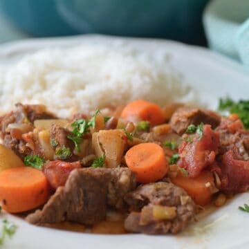 Middle eastern lamb stew with parsley and rice