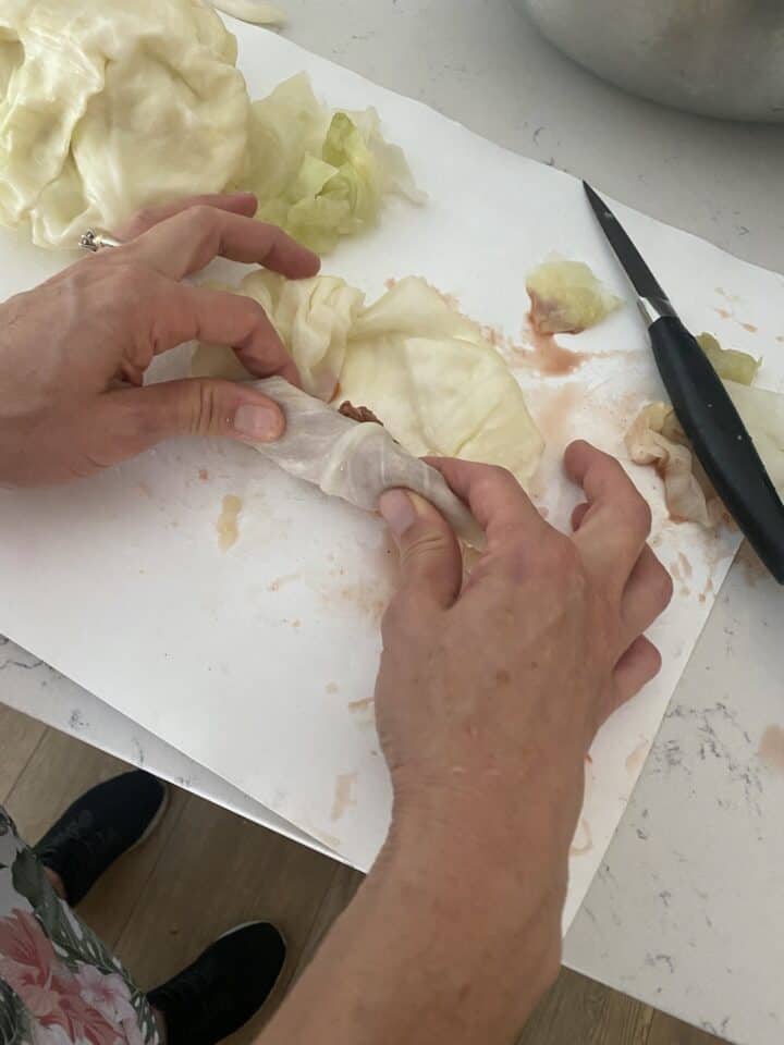 Rolling the cabbage rice dolma
